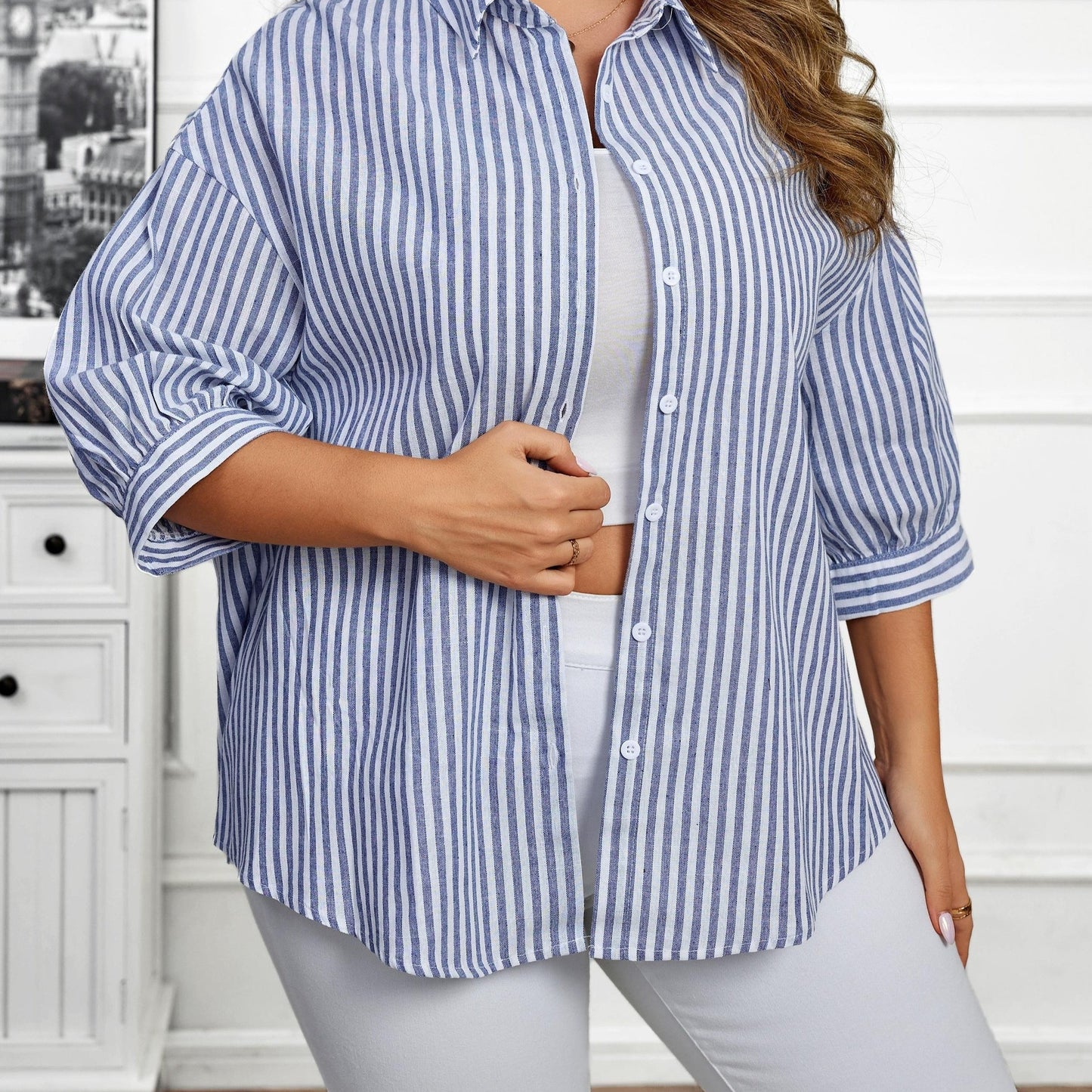 Stylish women's button-up shirt with stripes, long sleeves, and a classic collar. Made from a non-stretchy polyester blend, machine washable for all-season wear.