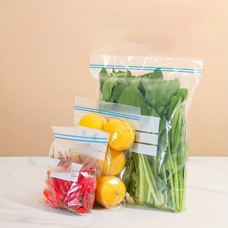 Reusable double-layer seal bags in a pack of 30, made of thick, food-grade plastic to keep your food fresh and suitable for freezing. Ideal for storing fruits, vegetables, and meats in the kitchen, these transparent bags are essential for sealing and