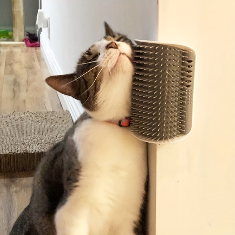 Wall-mounted self-groomer with massage comb for kittens and puppies.