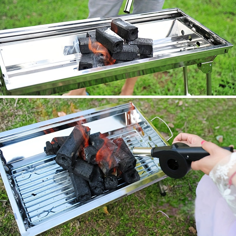 Handheld manual BBQ blower made of durable plastic for outdoor cooking.