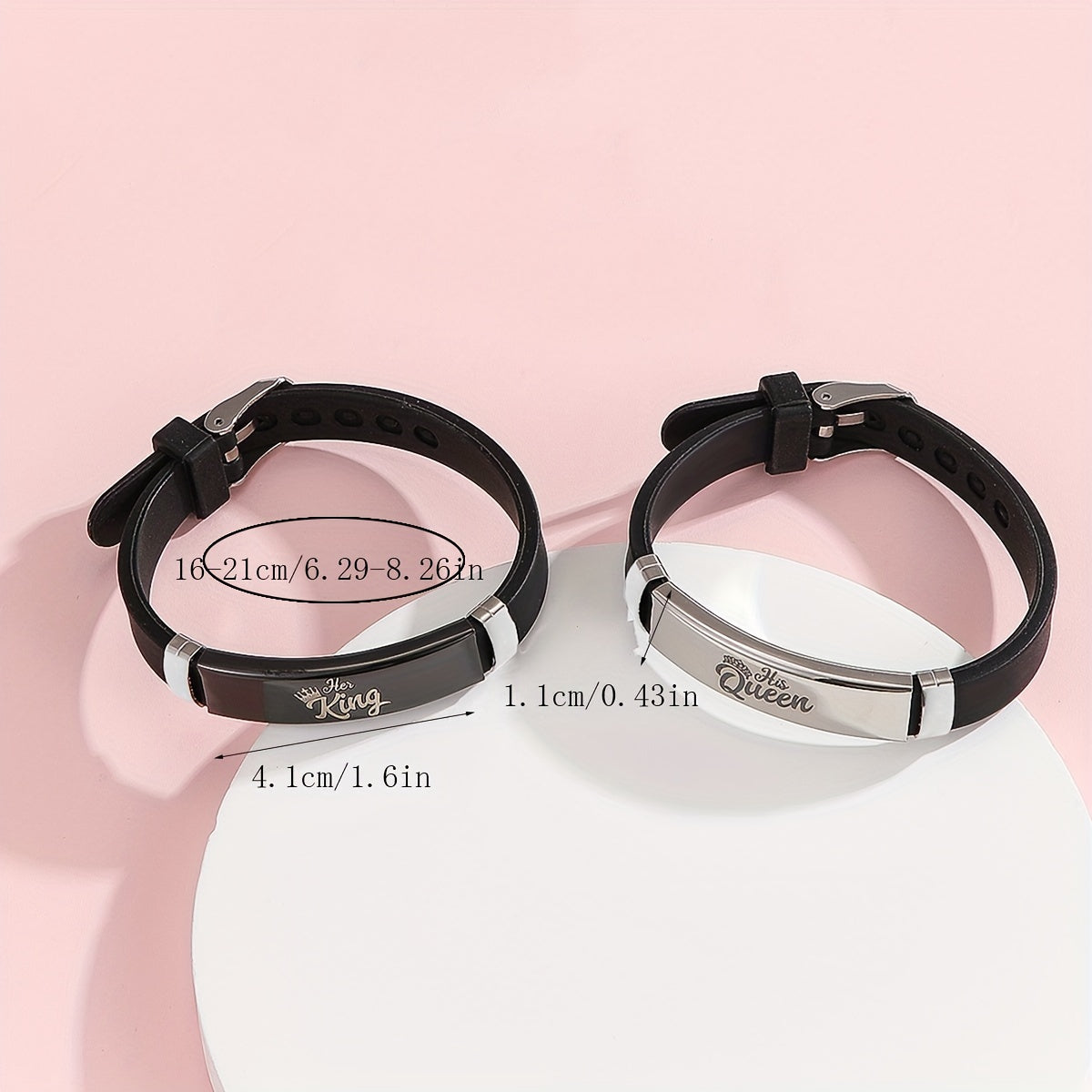 Pair of matching crown bracelets with a "HER KING" and "HIS QUEEN" design, crafted from glowing silicone material, perfect for couples.