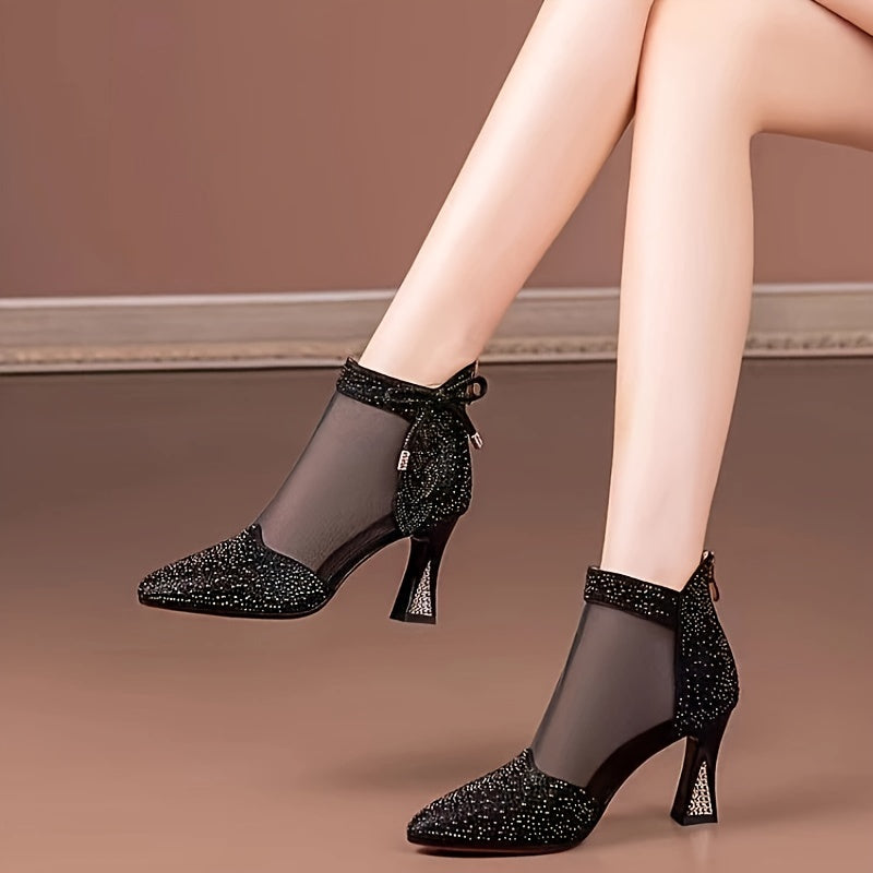 Stylish mesh ankle boots for women with pointed toe, rhinestone bow detail, chunky heel, hollow-out design, and back zipper.