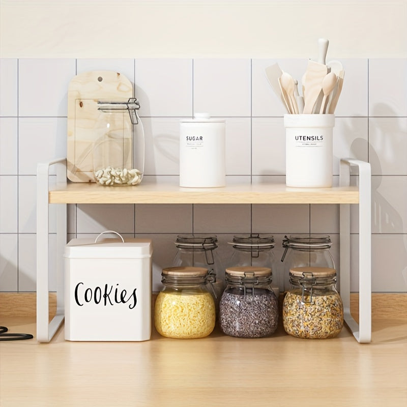 Iron frame and hardwood top kitchen shelf with 2 tiers, does not require electricity. Ideal for keeping kitchen items organized.