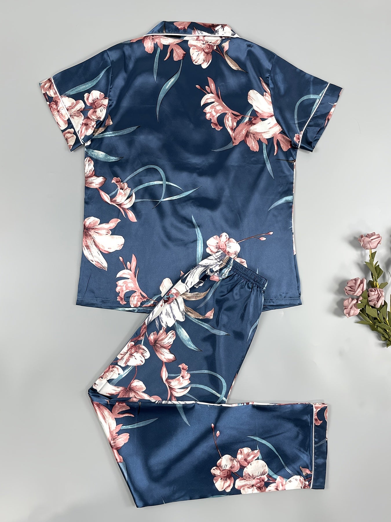 Three sets of six-piece satin pajama sets for women with printed short-sleeved buttoned cardigan tops and elastic waist trousers in a variety of colors.