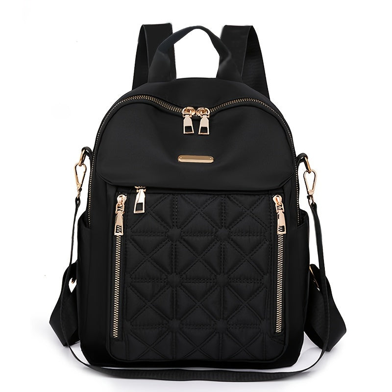 Stylish black nylon backpack for women with tassel detail, adjustable shoulder straps, multiple compartments for travel or daily use. Features durable zipper closure, quilted texture, and