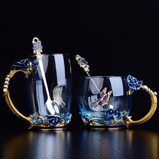 Rose enamel crystal tea cup with butterfly and rose design, includes spoon, clear glass.