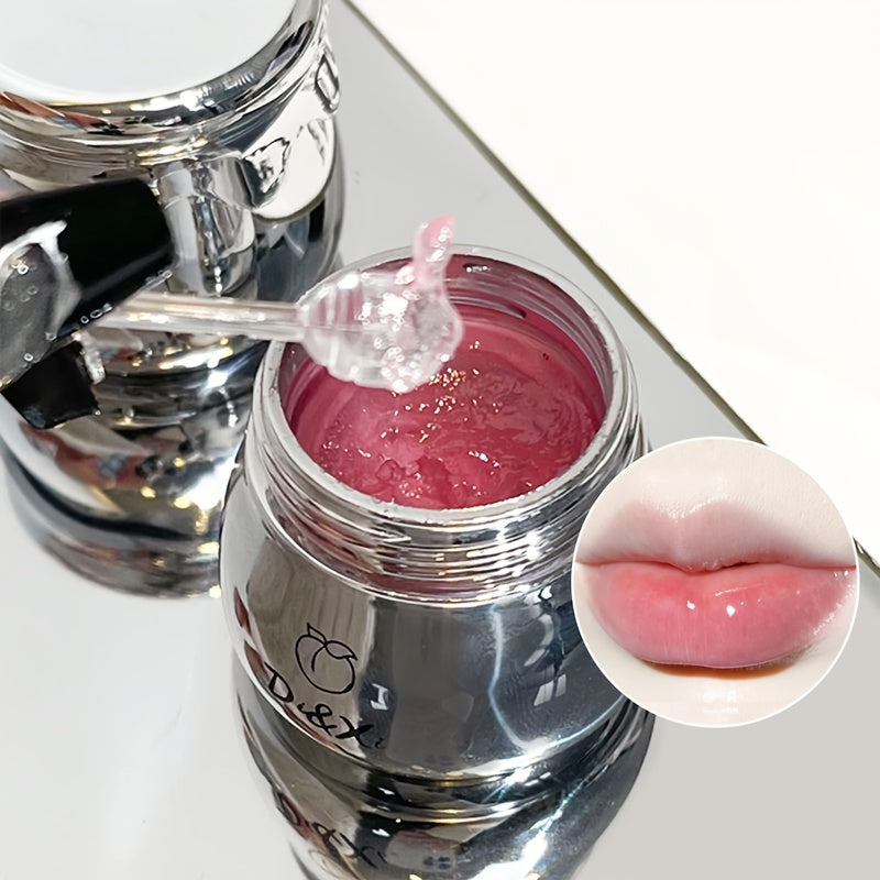 Silvery jar lip balm with peach flavor for moisturizing lips before makeup.