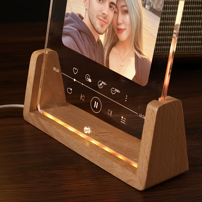 This personalized photo frame features a modern acrylic design with an LED love heart, creating a romantic atmosphere. It is USB powered and suitable for displaying a single picture on your desktop. This frame makes a creative and thoughtful birthday