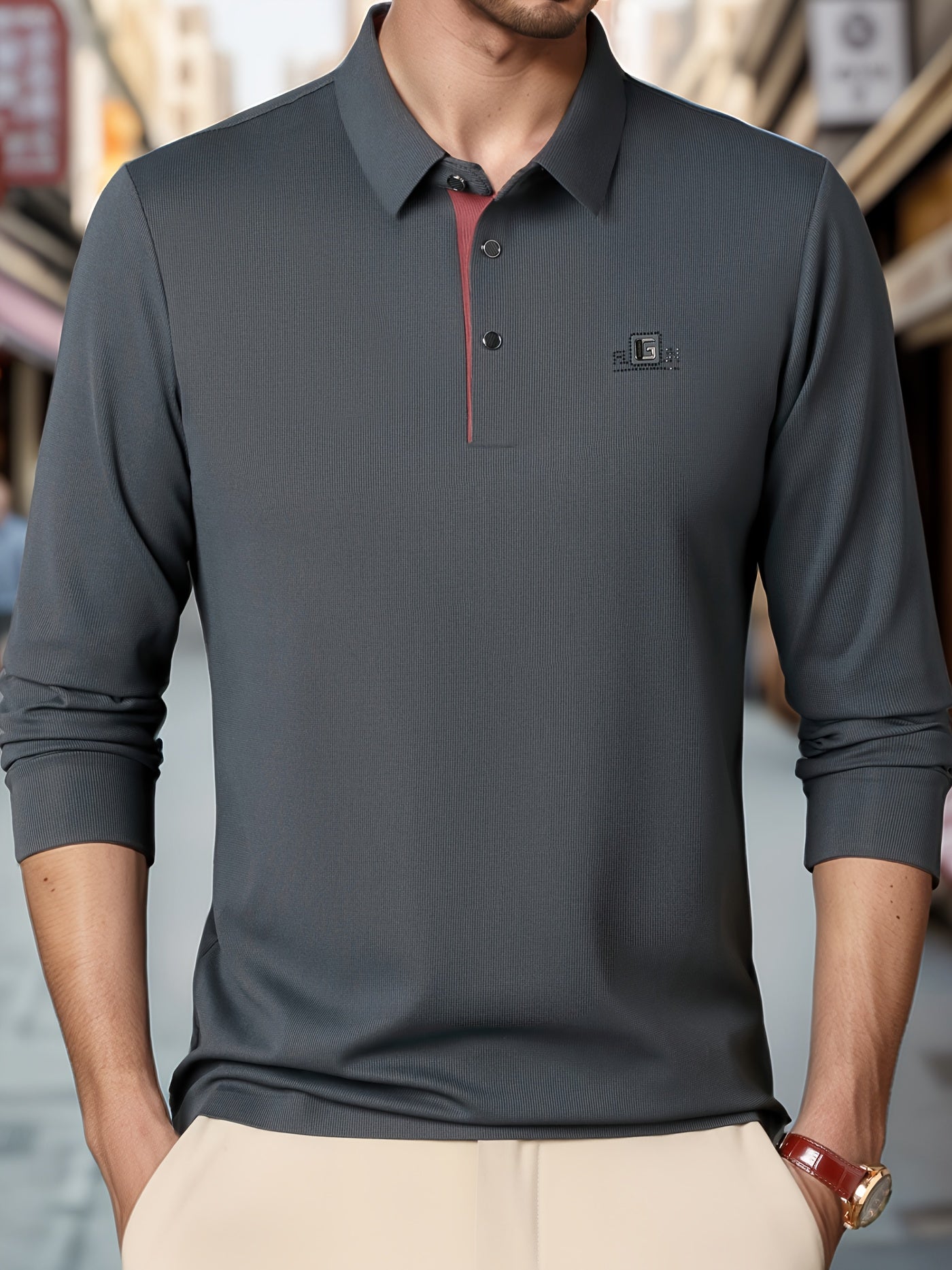 Men's golf polo shirt with letter print collar, perfect for both business casual and outdoor activities.