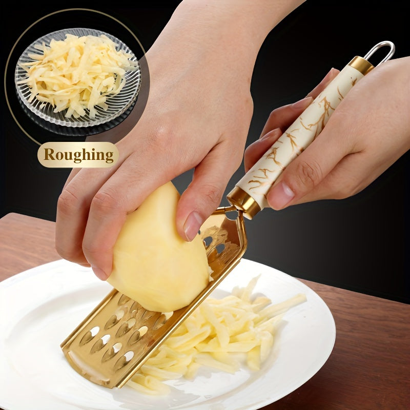 Stainless steel kitchen grater for shredding various foods, with a safe handle and luxurious golden appearance.