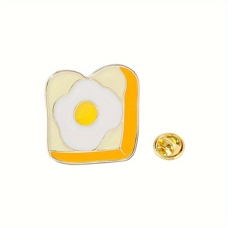 Set of five cartoon-inspired cute breakfast food enamel pins featuring bread-shaped minimalist brooches. These decorative lapel pin badges can be used on bags and jewelry to add a fun touch with pastry and egg-themed accessories.