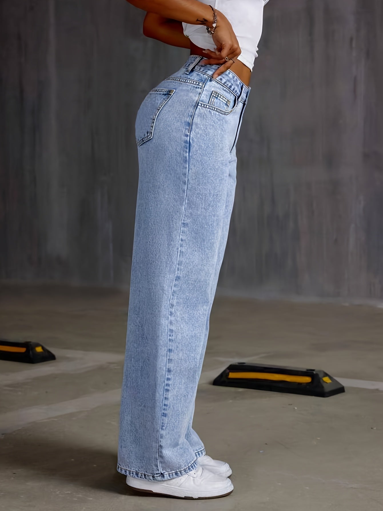 Women's high waist wide leg jeans with button fly, all-season solid color, slight stretch fabric. Made of 70% cotton, 27% polyester, 2% spandex. Features long length and washed finish.