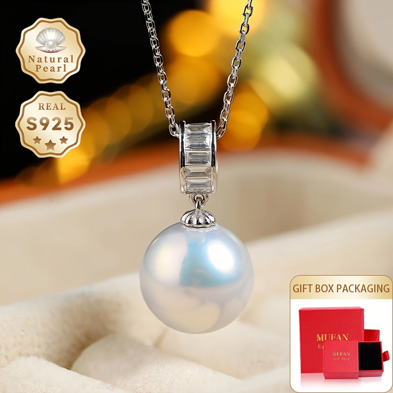 Surprise your loved one with this must-have gift - a stunning Pearl Necklace! This beautiful pendant necklace is made with S925 silver and features a 12-13mm round natural freshwater pearl. Each necklace is unique as natural pearls come in varying shapes