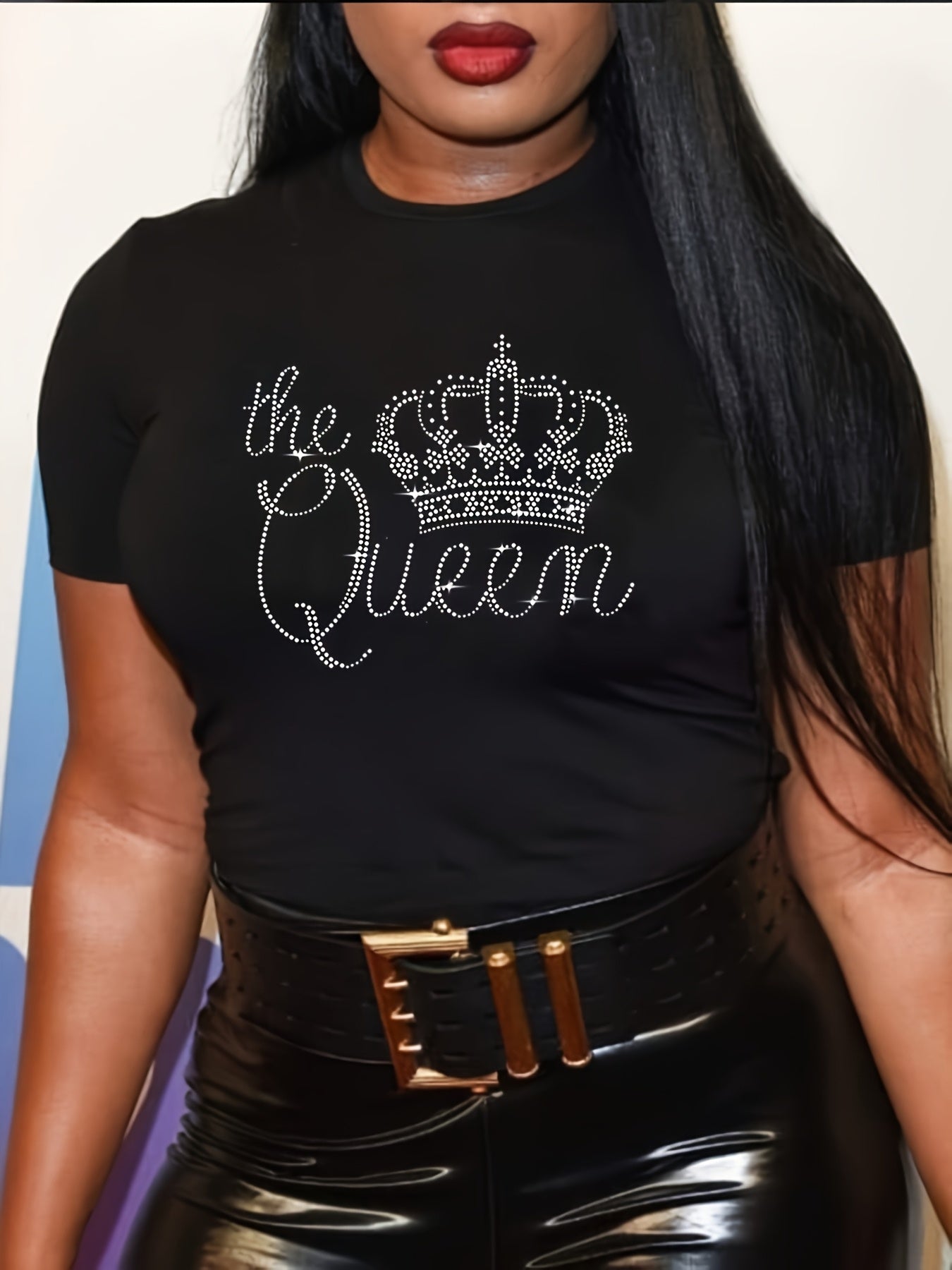 Plus size women's T-shirt with rhinestone crown design, crew neck, short sleeve, polyester knit fabric. From the spring/summer collection.