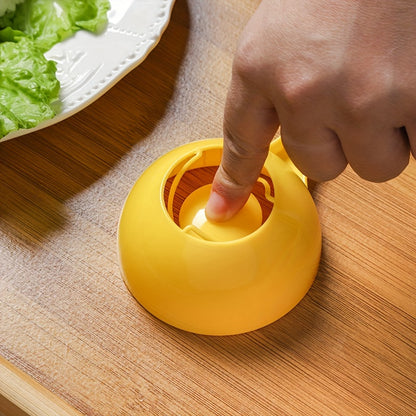 Large yellow plastic rice ball mold with easy-release feature, non-stick half-sphere design, and built-in strainer for kids' meals.