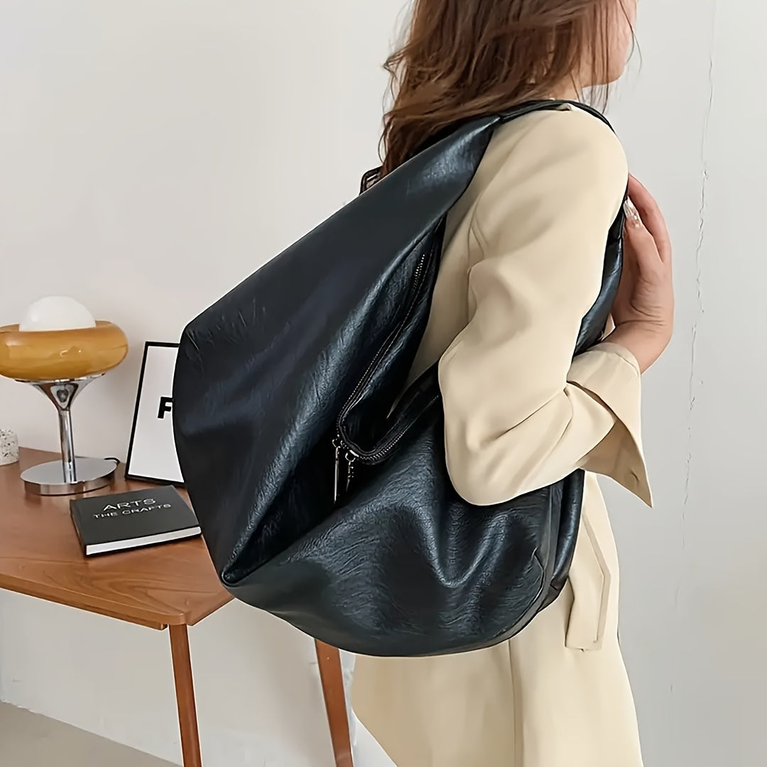 Fashionable vegan hobo bag with large capacity for women.