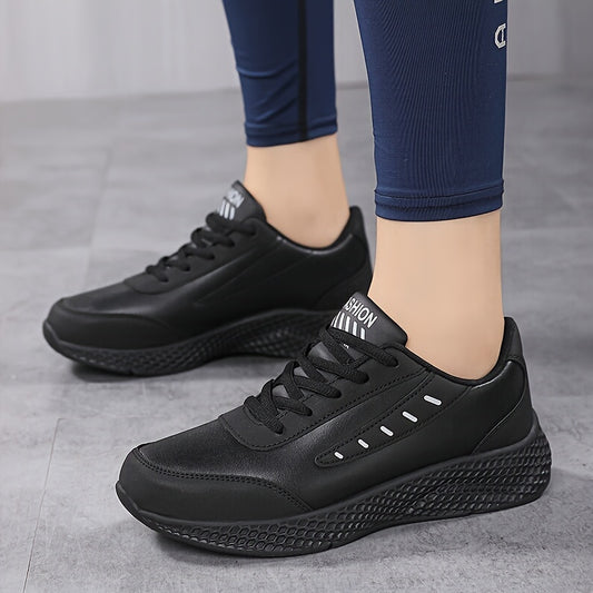 Black platform sneakers for women with lace-up design and comfortable fit, suitable for outdoor activities.