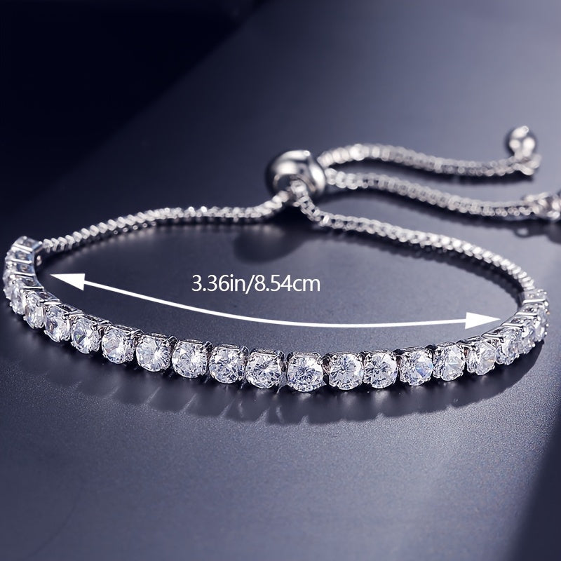 Stylish vintage-inspired cubic zirconia tennis bracelet with adjustable copper chain and sparkling rhinestones, ideal for parties or casual wear, great Valentine's Day gift.