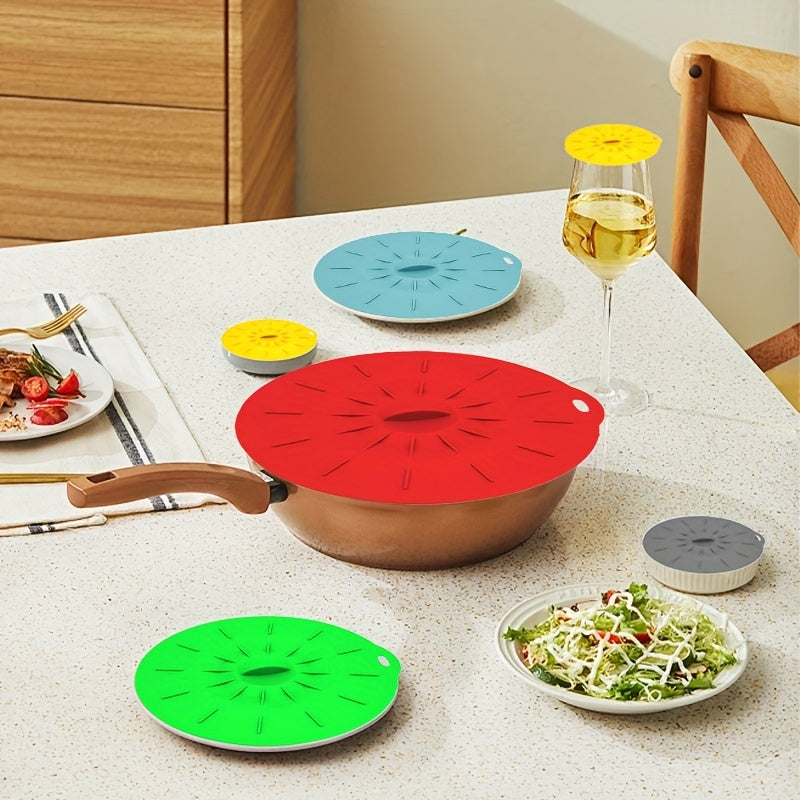 Set of 5 Colorful Silicone Food Lids - Seal tight, withstand heat & BPA-free covers for dishes, pots, and pans - Safe for oven, microwave, and fridge, simple to clean, with suction seal capability.