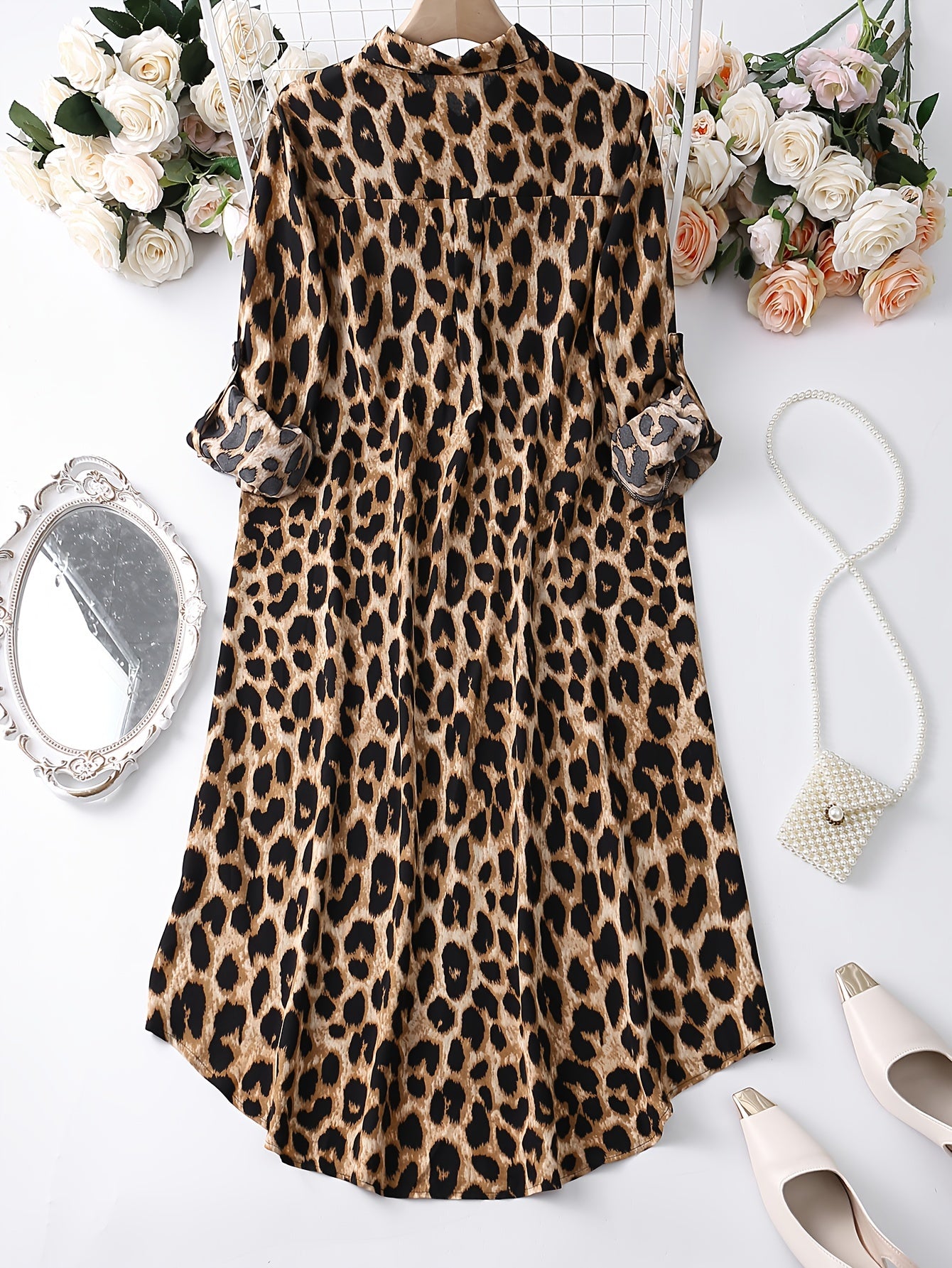 Leopard print button-up shirt dress with rolled sleeves, ideal for spring and autumn.