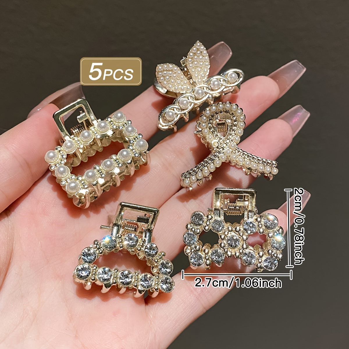 5 elegant hair clips with rhinestones and faux pearls in chic geometric design for girls. Made of alloy with sparkling accents, ideal for casual attire.