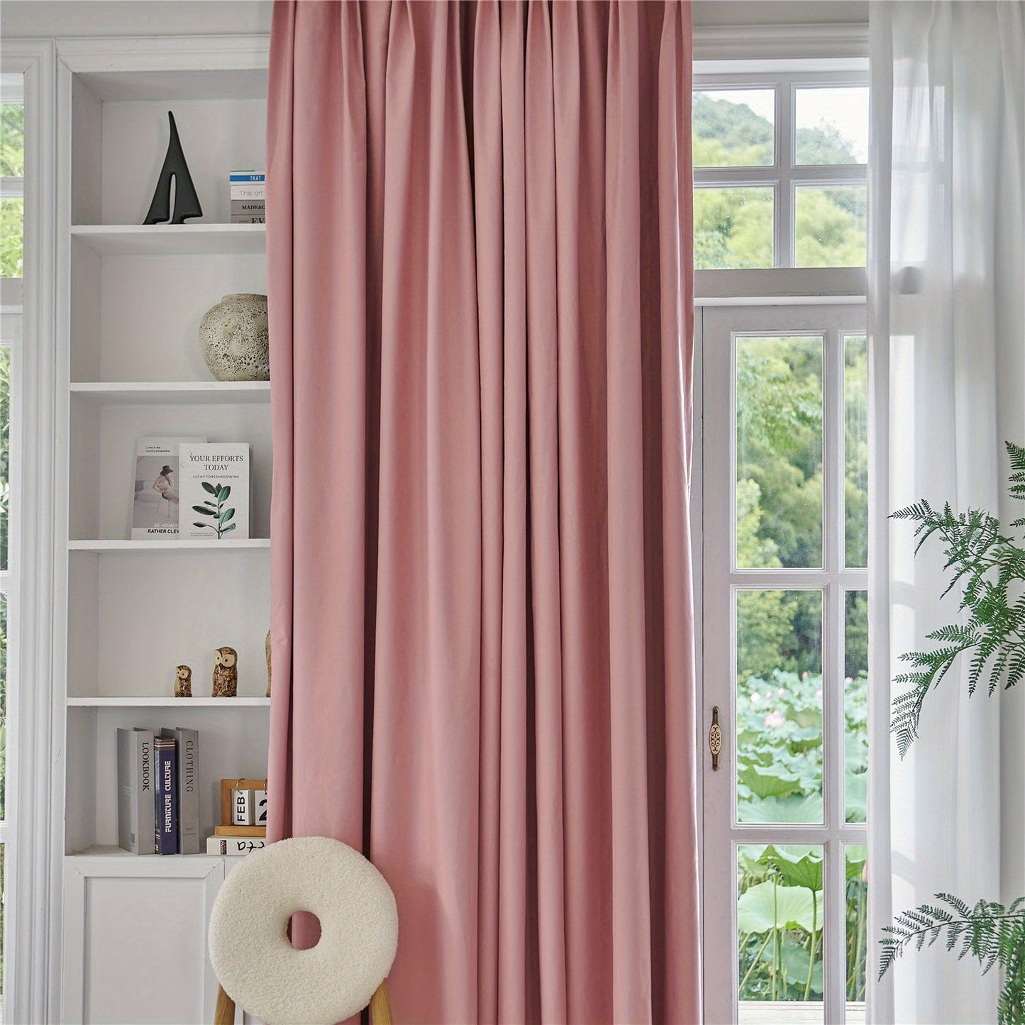 Blackout curtains in black or white color options available for bedroom and living room. These thermal lined curtains are insulated and light blocking, reducing noise in the room. Perfect for use in various rooms including living rooms, bedrooms