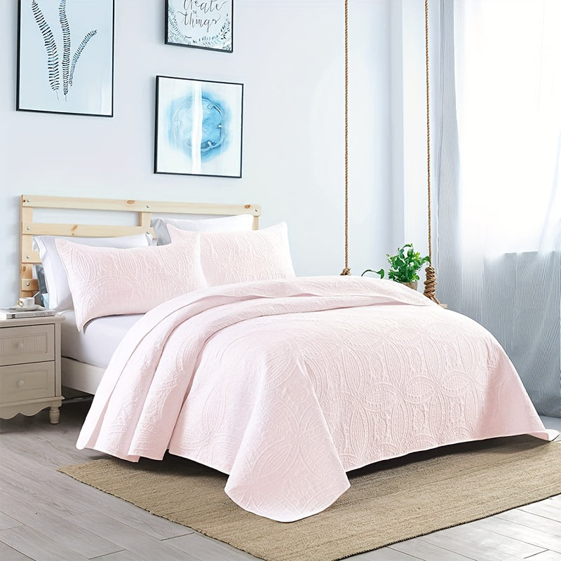 Comfortable and airy three-piece bedspread set featuring Soundwave technology and embossed circles design. Set includes one bedspread and two pillowcases, ideal for adding a touch of summer comfort to your bedroom or dorm decor. The perfect addition to