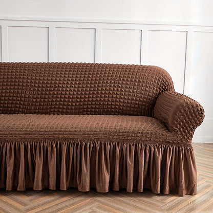 Seersucker skirt sofa cover protects couch from cat scratches in bedroom, office, or living room.