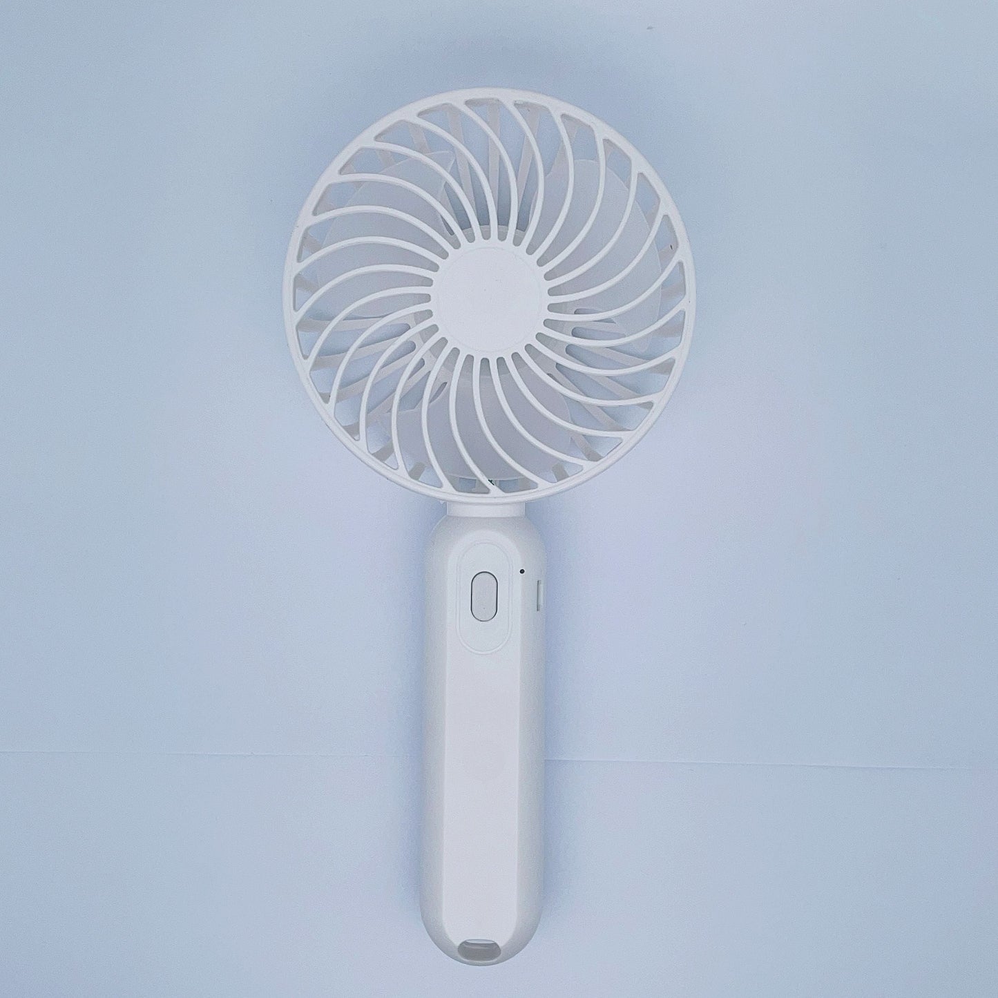 Mini USB Rechargeable Handheld Fan - The perfect portable cooling device for on-the-go use. With a height of 9.06 inches and a base diameter of 3.54 inches, this compact plastic fan is ideal for travel and outdoor activities.