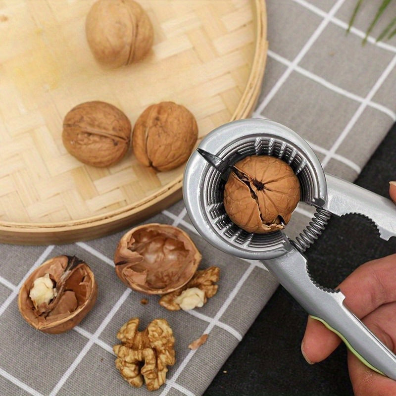 Multi-functional nutcracker made of zinc alloy, featuring a dual jaw design for effortless shelling of nuts and seafood. An essential kitchen gadget suitable for both home and restaurant use.