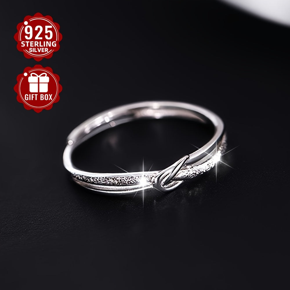 Women's adjustable sterling silver ring with starry knot rope design. Simple and frosted with a hollow plain opening. Hypoallergenic and lightweight, weighing approximately 1.2g.