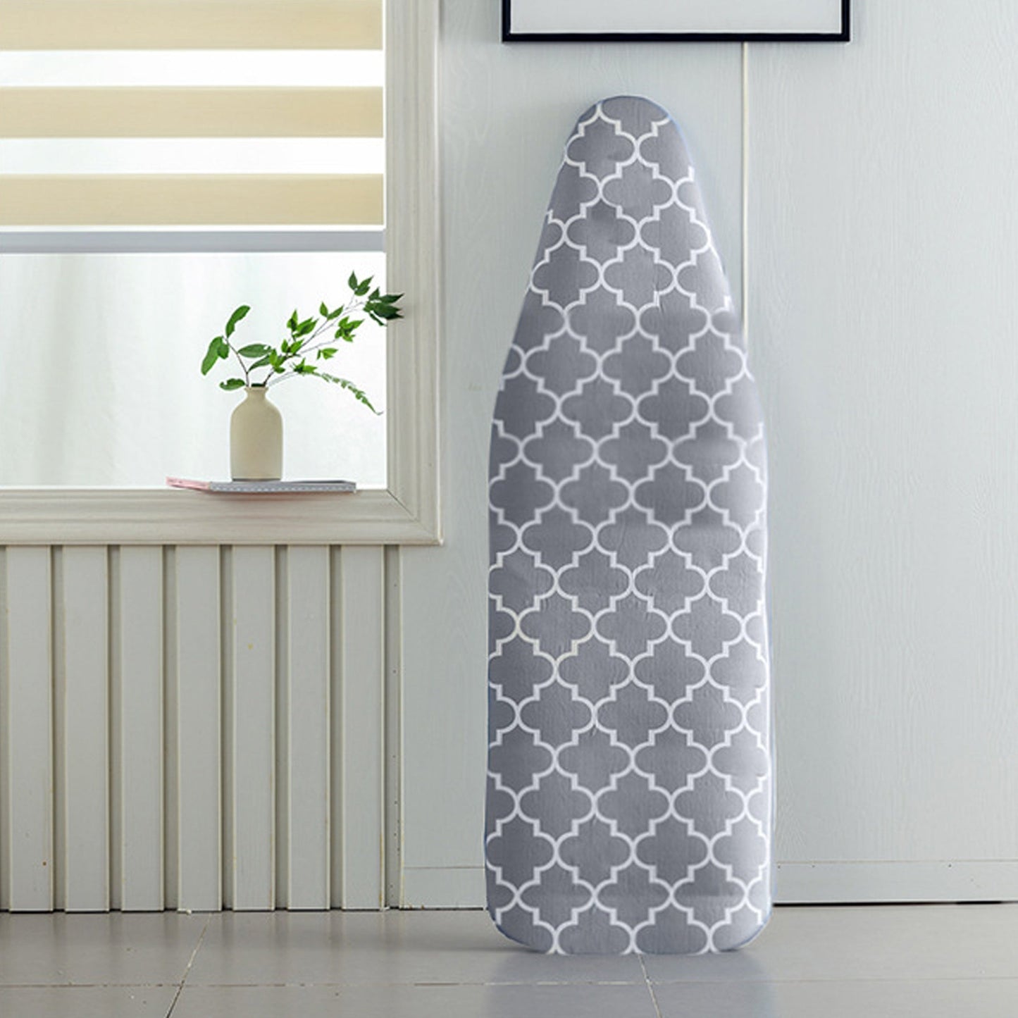 Get a stylish and durable ironing experience with our 1pc Thickened Ironing Cover. Available in various patterns, measuring 48.01x147.07 cm, this cover is easy to install with its elastic edge and drawstring strap for a perfect fit. Dust-proof and made