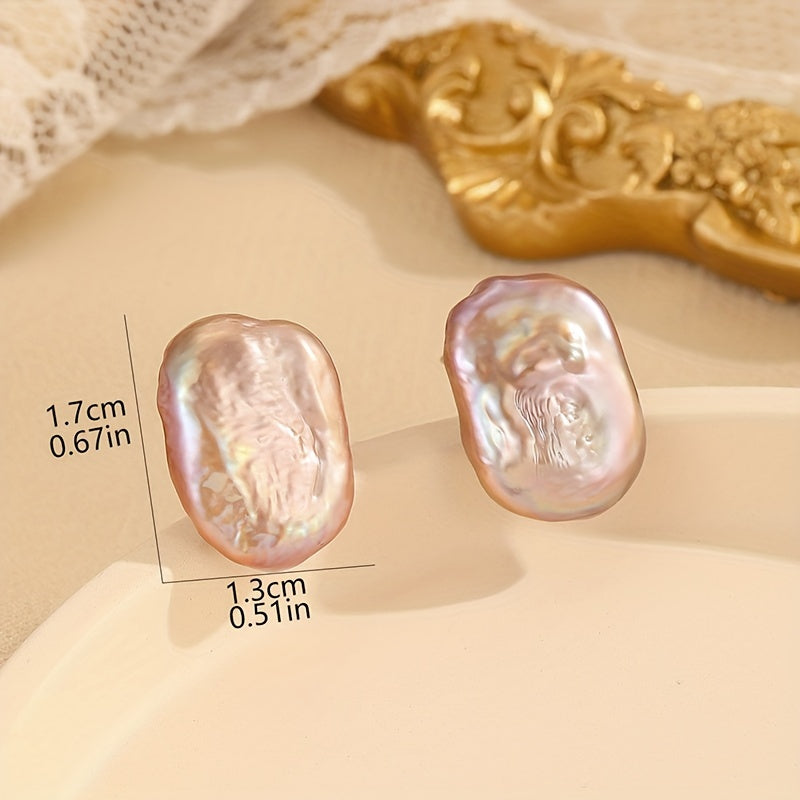 Vintage-style freshwater pearl stud earrings weighing 3.85g, featuring elegant S925 silvery posts. Ideal for casual wear or as a thoughtful gift.