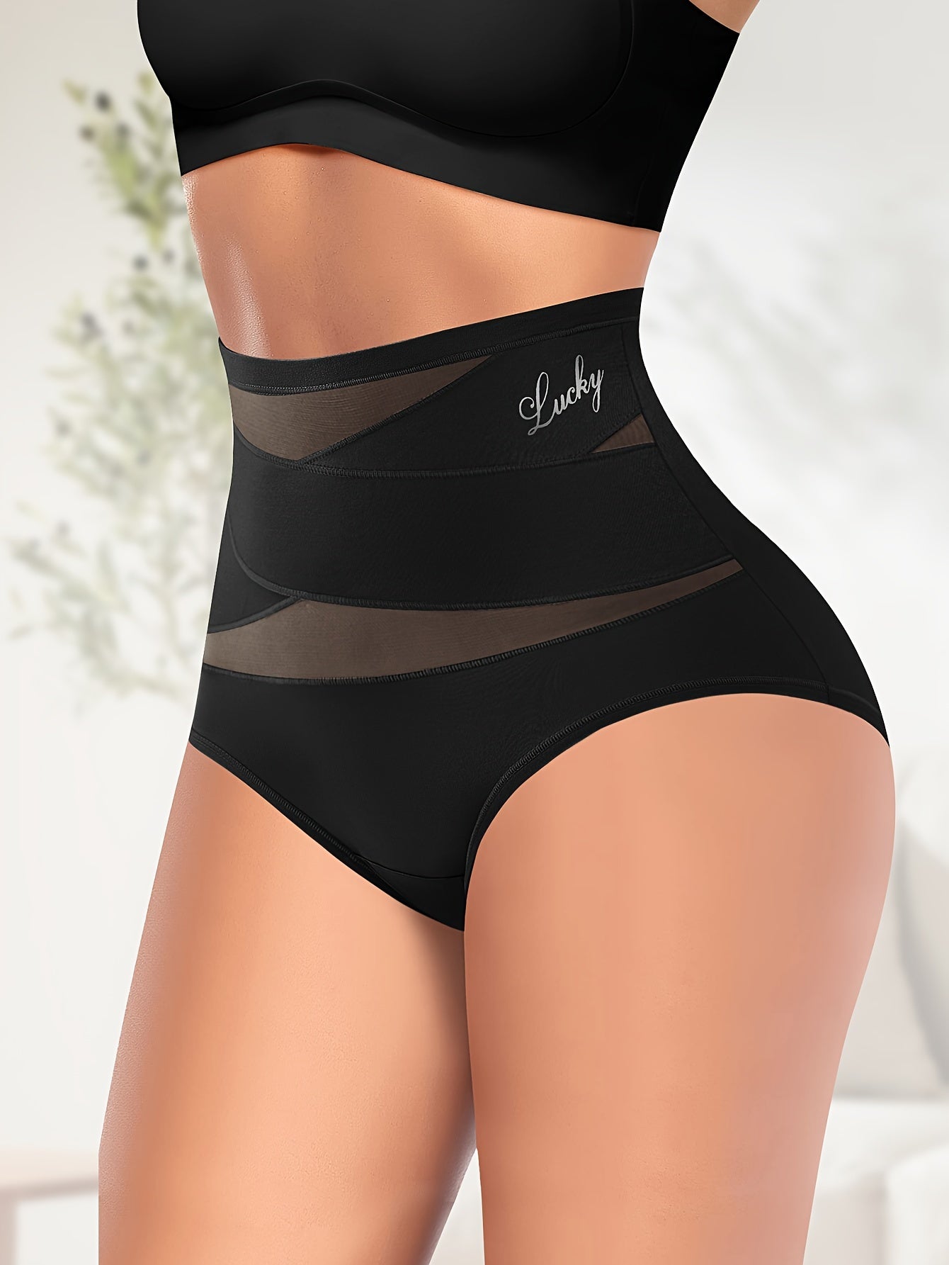 Breathable mesh high-waisted underwear with body sculpting design.