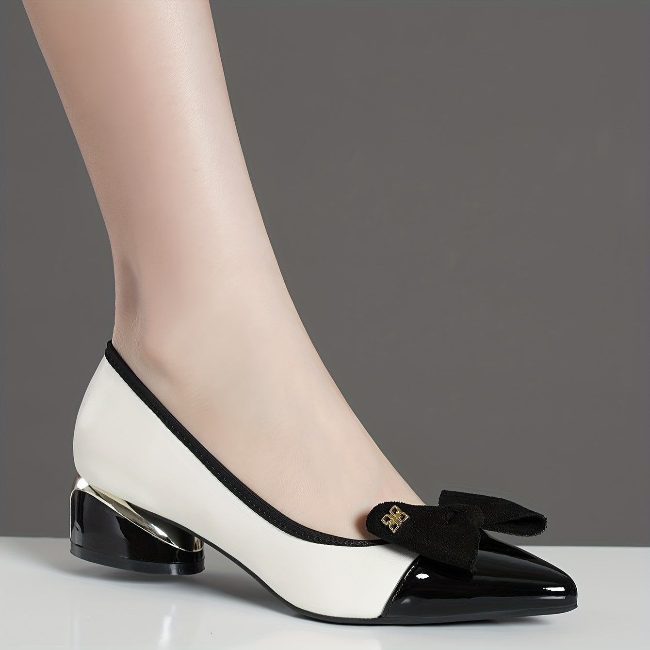 Chunky heels with bowknot decor and point toe, slip on style for stylish dress pumps.