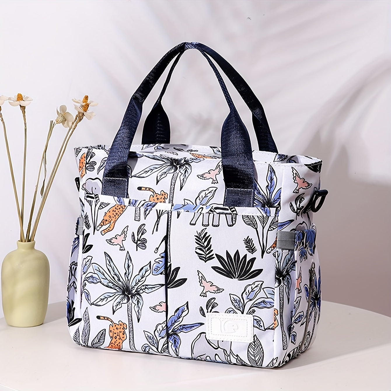 Parent Bag Designed with Stylish Floral Pattern - Large Oxford Fabric Organizer for Diapers and Kids' Essentials, Featuring Multiple Compartments and Shoulder Strap for Easy Carrying