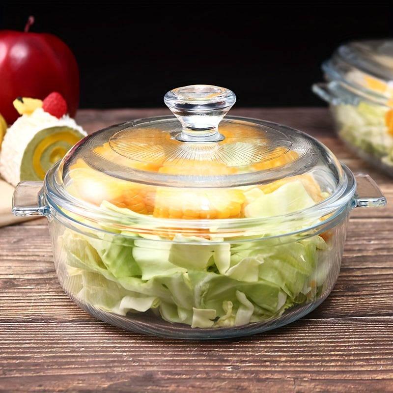 Glass casserole dish with lid designed for oven and microwave use. Dimensions: 28.09cm diameter, 21.11cm depth, with 11.0cm handles. Perfect for baking and cooking.