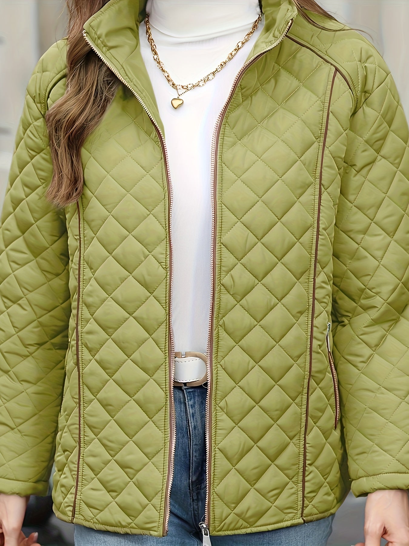 Women's plus size casual quilted outerwear with stand collar, zipper, and long sleeves. Made of 100% non-stretch solid woven polyester for fall/winter.