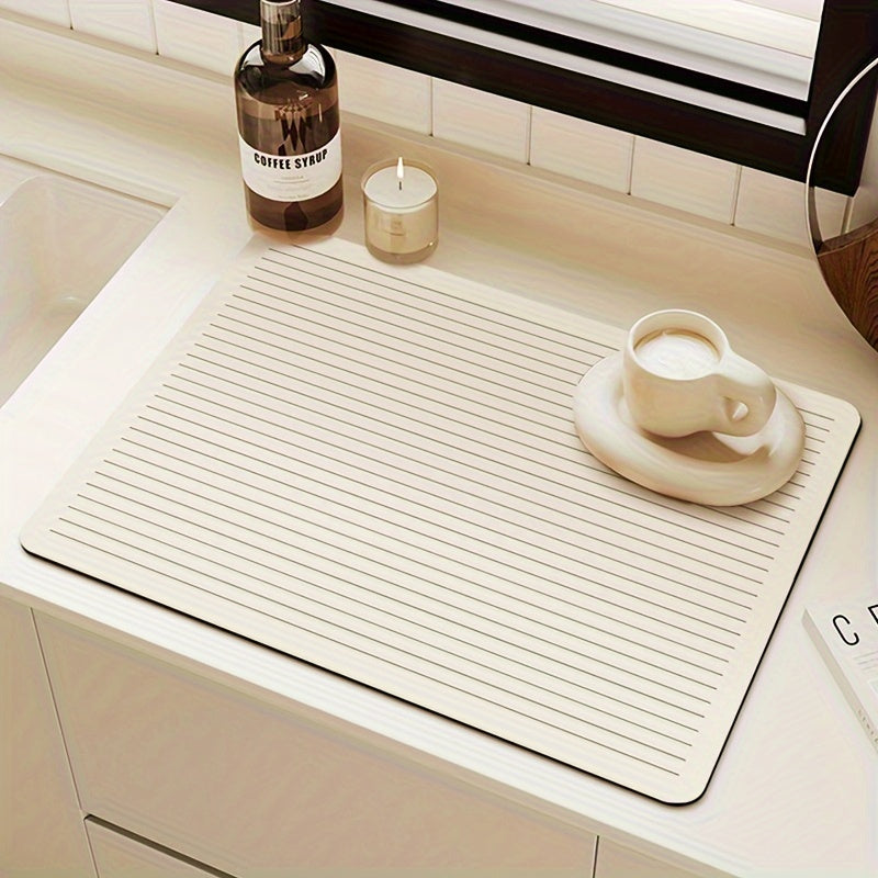 One piece of Pan Drying Mat that also functions as a Coffee Machine Surface Absorption Mat, Coffee Mat, Washstand Diatomium Drain Mat, Soft Faucet Suction Mat for kitchen supplies.