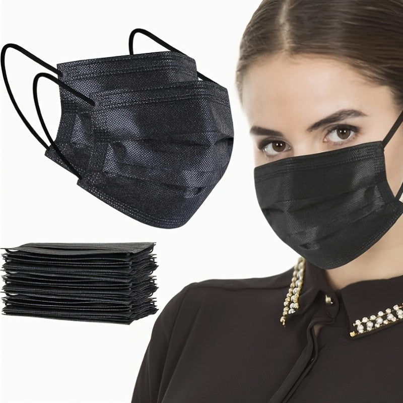 50-Pack of Black Disposable Face Masks featuring Elastic Ear Loops for Comfort. Made with 3-Ply Non-Woven Fabric and Meltblown Filter for added protection. Skin-Friendly and Leak-Proof design perfect for Adult Casual Outings. Breathable and Warm with a