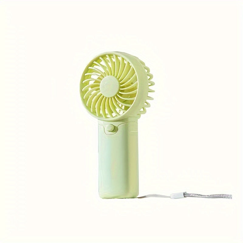 Compact Plastic Mini Handheld Portable Fan, Perfect for Personal Face Cooling On the Go! Battery Operated with Button Control, Ideal for Indoor and Travel Use. Requires 2 AAA Batteries (Not Included). Multiple Components Included.