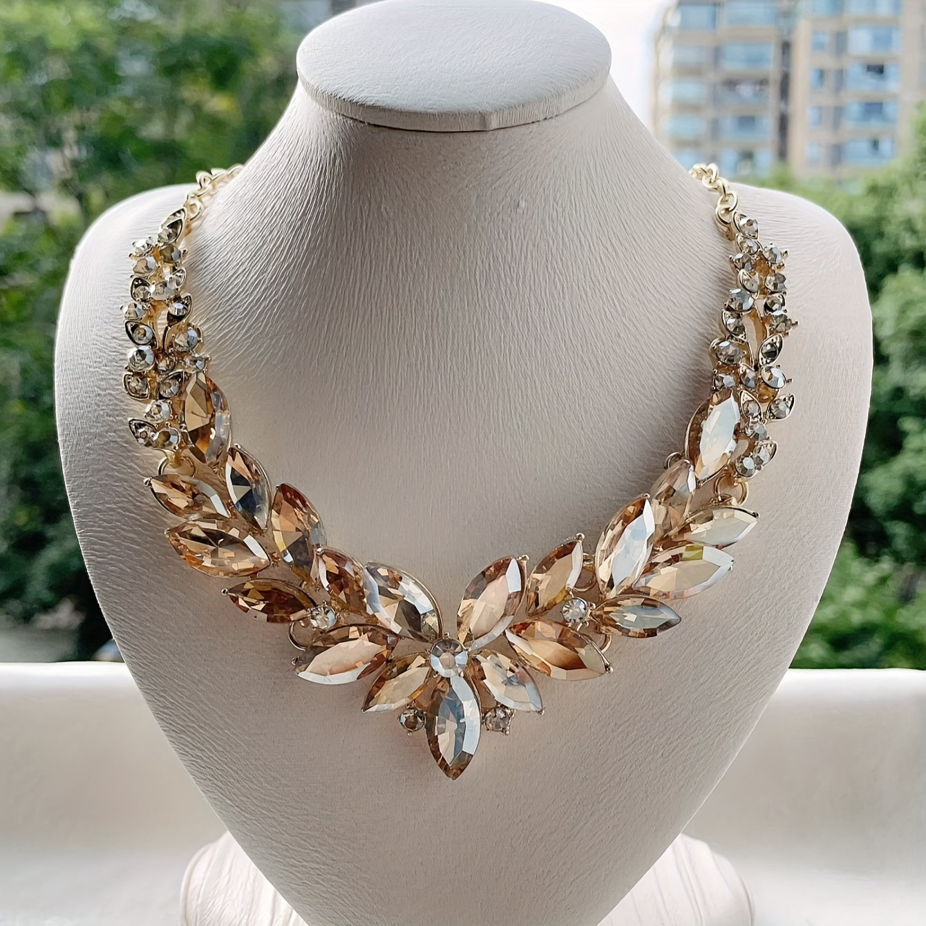 Luxurious and stylish rhinestone statement necklace - a bold and chunky bib necklace that is the perfect gift for fine jewelry lovers.