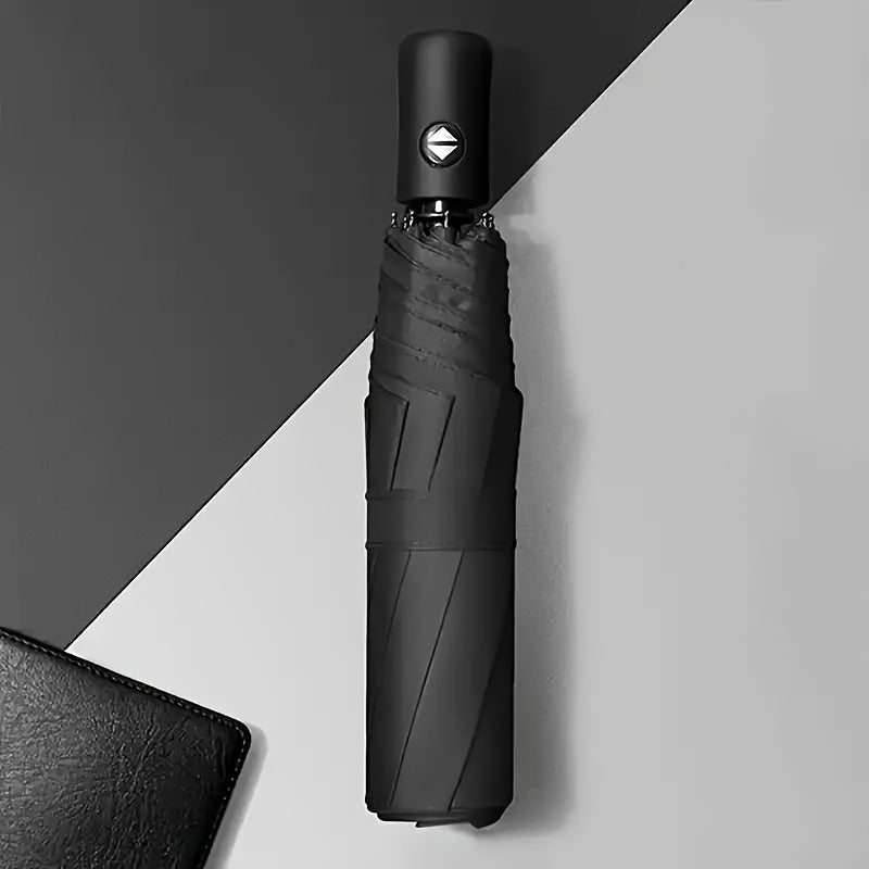 Essential for executives! Eight-bone automatic folding umbrella, windproof and rain-resistant. One-button operation for easy use in any weather. Available in navy blue, black, red, and dark