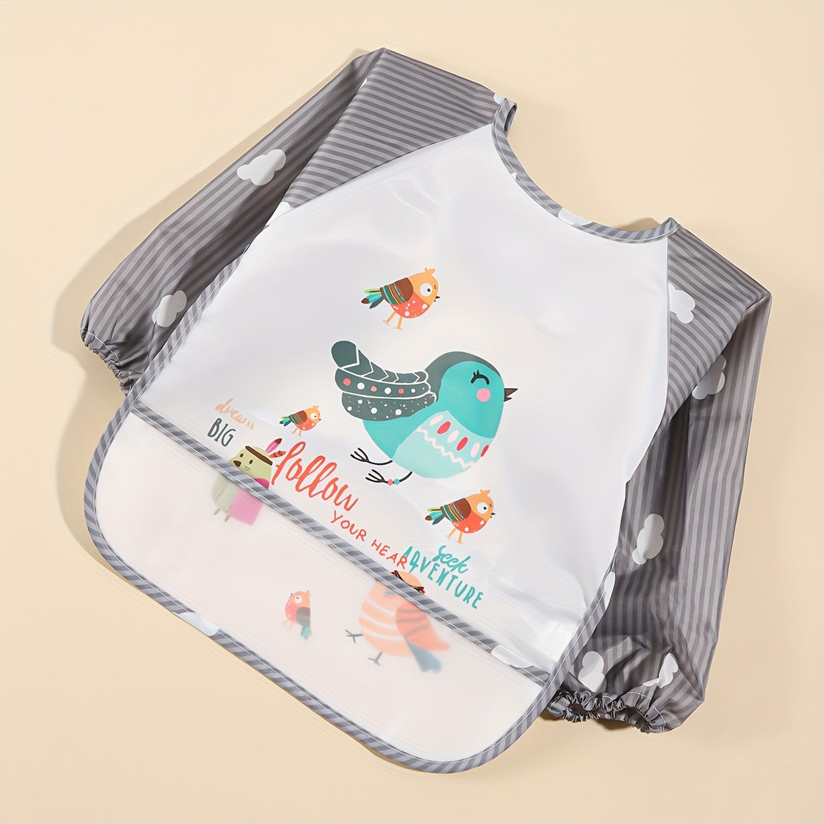 Long-sleeved Waterproof Feeding Bib with Adorable Cartoon Design, Reversible Wear Option.