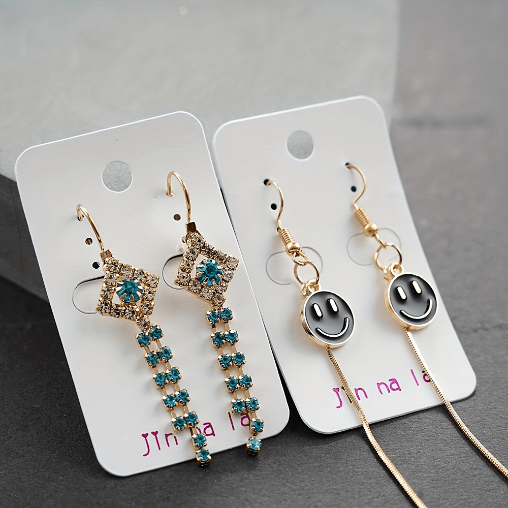 Set of 20 pairs of dangle earrings adorned with dazzling rhinestones, featuring an elegant and classic style. Crafted from zinc alloy, these trendy accessories are perfect for adding a touch of sophistication to any outfit. Ideal for fashionable women