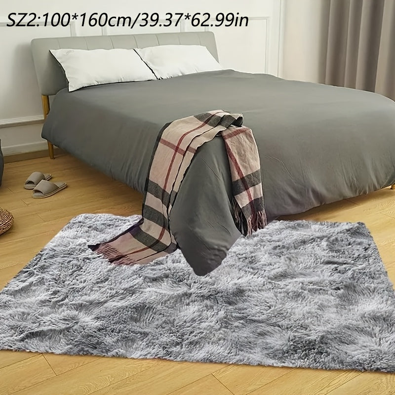 A stylish light grey tie-dye gradient plush carpet perfect for your living room, coffee table, or bedside. This long-haired washable mat is ideal for adding a touch of Nordic style to your bedroom.