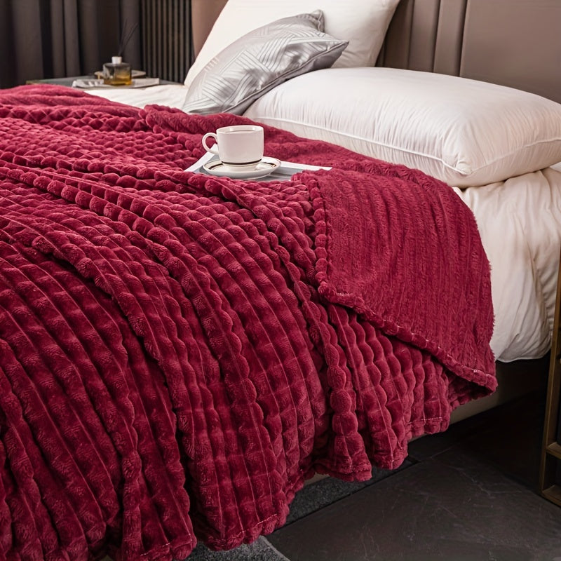 An imitation rabbit fur bed blanket featuring a corn grain pattern.