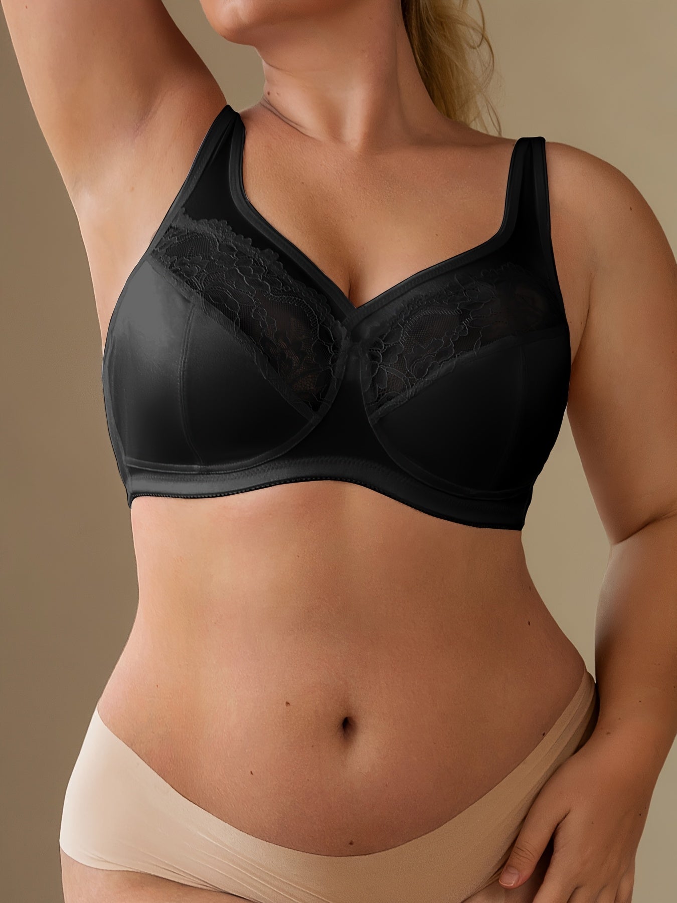 Stylish lace-trimmed tank bra for plus-size women - non-padded cups, breathable fabric, and sexy underwire design.