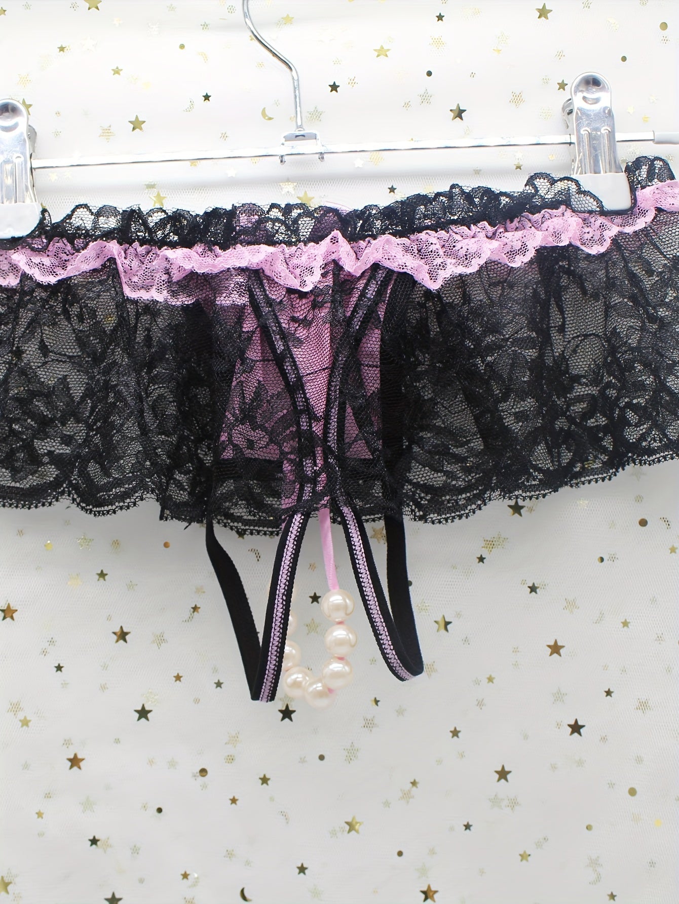 Women's sexy lingerie including floral lace mesh thongs and bow tie open crotch faux pearl panties.