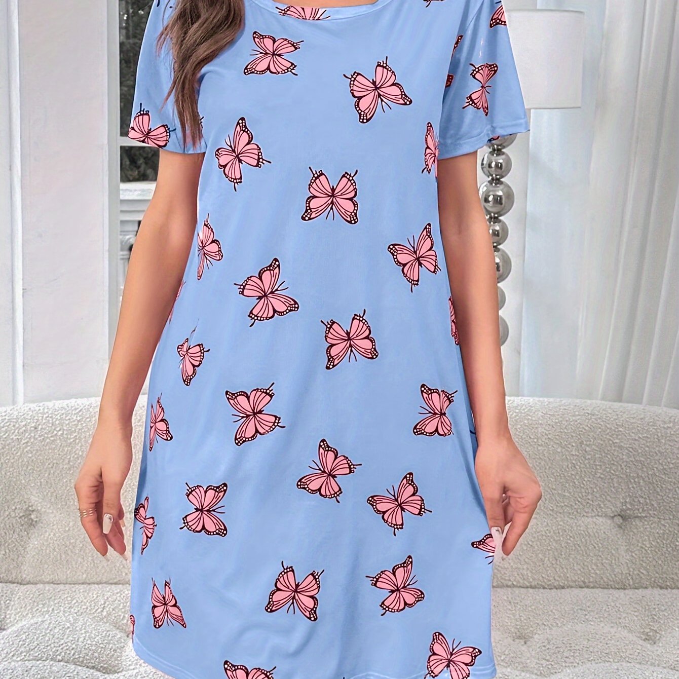 Butterfly print nightdress with short sleeves and round neck tee, ideal for women's sleepwear.